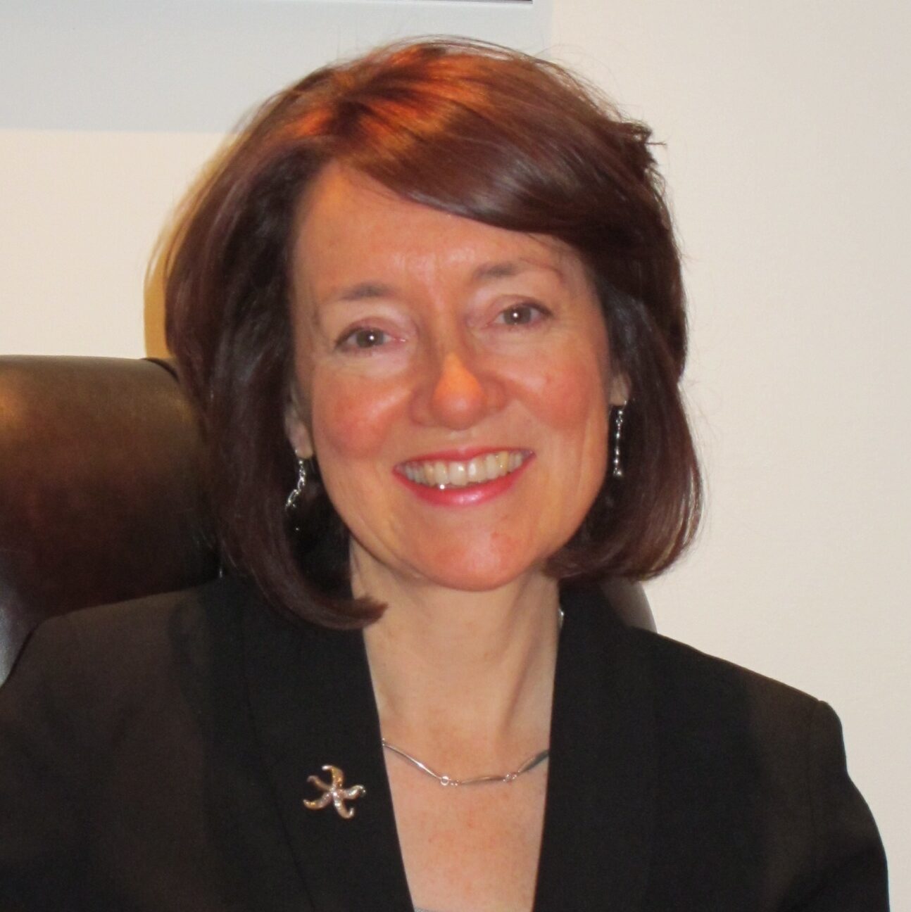 headshot of jacquetta trasler